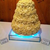 Choolate Roses 12", 10", 8" & 6" cake covered in Handmade chocloate Roses with edible diamond centres