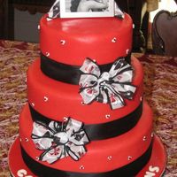 Bobbi's Cake This was a special cake for a special niece. The top was 6" choc. w/ buttercream, the middle was 8" amaretto w/ choc buttercream...