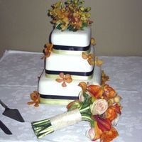 My Third Wedding Cake. Fondant with satin ribbon and fresh flowers.