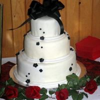 Black & White Wedding Cake This was my first 'real' wedding cake.. I had made one before but it was a dummy cake. Despite my best efforts, and quite a bit...