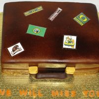 Suitcase For a good bye party. Stickers were printed out & laminated, no time to get an edible image done.