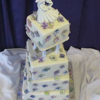 Hydrangea Wedding Cake My first wedding cake, exactly what the bride wanted! MFF, chocolate pearls, 12" tuxedo, 10" dreamsicle, 8" cherry vanilla...