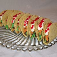 Tacos WASC cake died brown (he doesn't like choc cake!); candy melt shells w/ a touch of food coloring amd two crushed up oreo cookies, and...