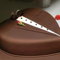 Tuxedo Groom's Cake 12" chocolate heart-shaped cake filled and iced with cream cheese buttercream then covered with chocolate Pettinice fondant. Real...