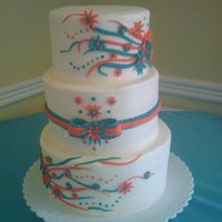 Three Thier Sweet 16 12 in, 10 in and 8 inch. Customers wish was orange and teal colors on white base.Done together with 100 regular and 100 mini cupcakes in...