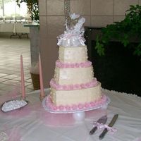 Heart Shaped W/buttercream Dream & Fondant Roses The fondant roses were a long process and felt like it took me forever to get done but I was pretty happy with the finished product.