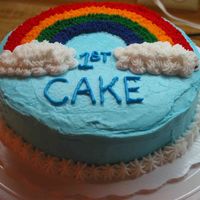 My Very First Decorated Cake Rainbow Cake from Wilton Course I - Excellent cake to try out the icing colors (not enough RED, too much YELLOW).