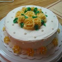 Final Cake From Wilton Course I Final Cake from Wilton Course I - I liked the way the yellow turned out this time... Wish I would've lifted up the center rose some (...