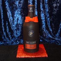 Remy Martin Bottle Cake This was probably my biggest challenge to date. Six 6" round cakes and the bottle top is made from rice crispy treats. Covered in...
