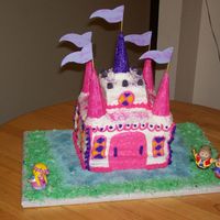 Castle Cake First attempt at a castle cake. It was hot and humid that day so my icing was starting to sag a little. Not bad for a beginner I guess.