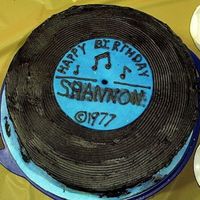 Record Cake A 'stack of records' cake for a friend of mine. The 'copyright' is her birth year.