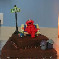 Elmo This was a dark chocolate cake with dark chocolate buttercream frosting. Elmo is made from rice crispy treats then frosted. Everything else...