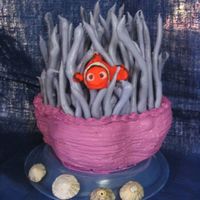 Nemo In The Anenome This was a butter yellow cake, baked in a stainless steel mixing bowl then sculpted. Covered in buttercream. The anenome 'tenticles&#...