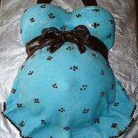 Just Another Belly Cake This was a surprise for my newly pregnant friend. White cake with almond honey buttercream. Decorated with MMF.The pic isn't the best...