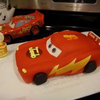 Lightening Mcqueen Thanks to merissa for the tutorial and inspiration. My grandson loved this cake. Sculpted chocolate and raspberry cake layers covered in...