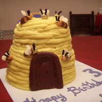 Beehive Cake Beehive cake frosted in honey buttercream (a bit too soft and sticky for nice, neat piping, but it tastes great). Tootsie roll bees. Made...