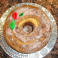 Sour Cream Coffee Cake I made this for my dad's birthday. I thought it looked plain so i made a fondant rose and leaves and painted them with food coloring...
