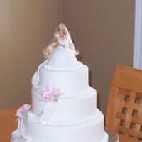 Train Of Roses First wedding cake I have ever made. Roses are made of gumpaste.