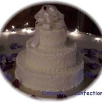 Knoll Wedding This cake was very much inspired by a cake in the gallery by JenniferMI. I made an attempt at her beautiful scroll work, but still have...