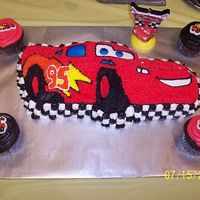 Disney- Cars Movie This cake was for my godson. I actually forgot to icing the part where you see the checkered flag look, so the checkered flag fit the cake...