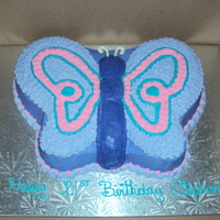 Butterfly white cake with buttercream icing.