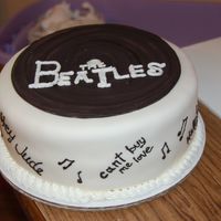 Beatles Cake wasc cake...for a 24 yr old that loves the beatles...lyrics from different songs around the whole cake...she loved it...didnt want to eat...