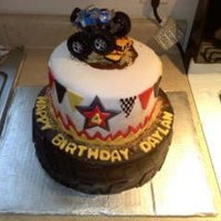 Monster Truck Cake Design This was for my nephew...bottom was made to look like a big tire..."dirt" was graham crackers :)