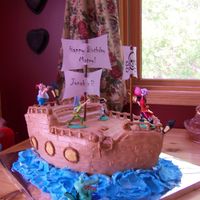 Jonah's Pirate Ship B-Day Cake I did this for my son's 3rd bday. He wanted Peter Pan pirate ship cake. I bought the Peter Pan toys to put on it. WASC MMF. It took me...