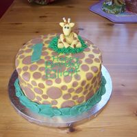 Giraffe Cake This was my first order for a complete stranger. I think I put WAY too many dots on it. I didn't realize it til my mom said it and it...