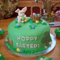 Easter Cake Buttercream with fondant accents. Fondant bunny and basket. Eggs are Reeses peanut butter eggs. I loved making this! Oh, I had some left...