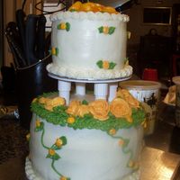 Mom's Cake Done for my Mom. Yellow cake with whipped cream and fresh strawerries & blackberries for the filling. All iced in buttercream.