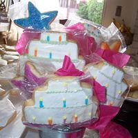 My First Cookie Bouquet I made this for my friends birthday. They are NFSC and Antonia74 Icing, they were yummy.