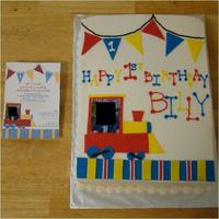 Train Cake Made to match the invitation for a first birthday. Buttercream icing with fondant accents & an edible image of the birthday boy.