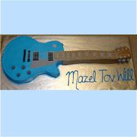 Electric Guitar Cakes I made 2 of these life size guitar cakes & 3 sheet cakes to go with them. They were the biggest cakes I've done yet!! Iced in...