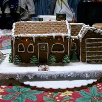 Gingerbread House 2008 A small gingerbread house I did for my Aunt & Uncle- a general replica of their house. The lights are actually battery powered rice...