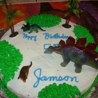 Dinosaur Birthday Cake My son wanted a dinosaur cake, didn't have the pans...so, kinda just worked with an idea I had...I'm not a professional, but it...