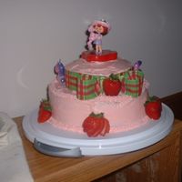 Strawberry Shortcake This is the faniciest cake I've ever attempted! My girls loved it!