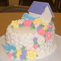 Course 2 Final Cake I really did not enjoy using color flow and my birdhouse and birds didn't turn out well. But overall I'm happy with how my cake...