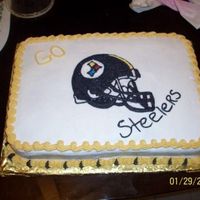 Steelers Cake I just did this cake last night for my co-worker. I did the helmet with RP and BC icing.