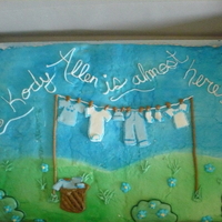 Baby Boys Clothes Line All buttercream. Clothes are fondant.
