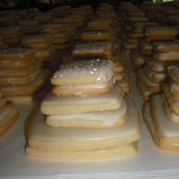 Wedding Cake Cookies Made 200 wedding cakes for my brothers wedding. There are 6 cookies all sugar cookie with royal icing. It was a big hit at the wedding