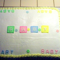 Baby Cake Did this cake for a co-worker. It's been a long time since I made a cake, it looks a little ruff. (She loved it any way)