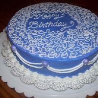 Cornelli Lace all buttercream with purple fondant pearls. im still trying to master the whole writing thing... this is the first time i have used...