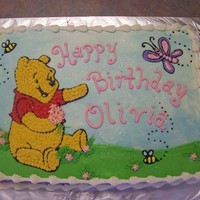 Winnie The Pooh This is a 1/2 sheet iced and decorated with buttercream.