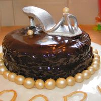 Birthday Cake I was trying to make canache and expirimented with marsepine. Ooow and bought those shine dusts! (Perle, zilver and gold) :)The shoe went a...