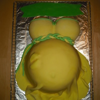 Yellow Belly Belly made out of Pyrex bowl and 9 in round carved to shape. I used the sports ball pan for chest. Covered in fondant with a cheerio and...