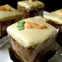 Carrot Cake Squares Individual Carrot Cakes with cream piped carrots.