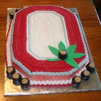 My First Cake For Dad's surprise 60th B-day party. This was my first cake, not perfect , but Dad loved it. Chocolate with Raspberry/White Chocolate...