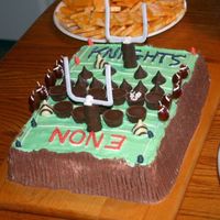 Football Birthday For my son's 10th birthday. White cake with buttercream. Players are minature reese's cups and kisses, with my son's...