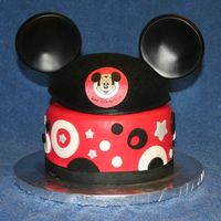 Vacation Tribute My final cake for the Wilton Fondant/Gumpaste class. My family just went to Disney World on vacation and I was still in a "Mickey&quot...